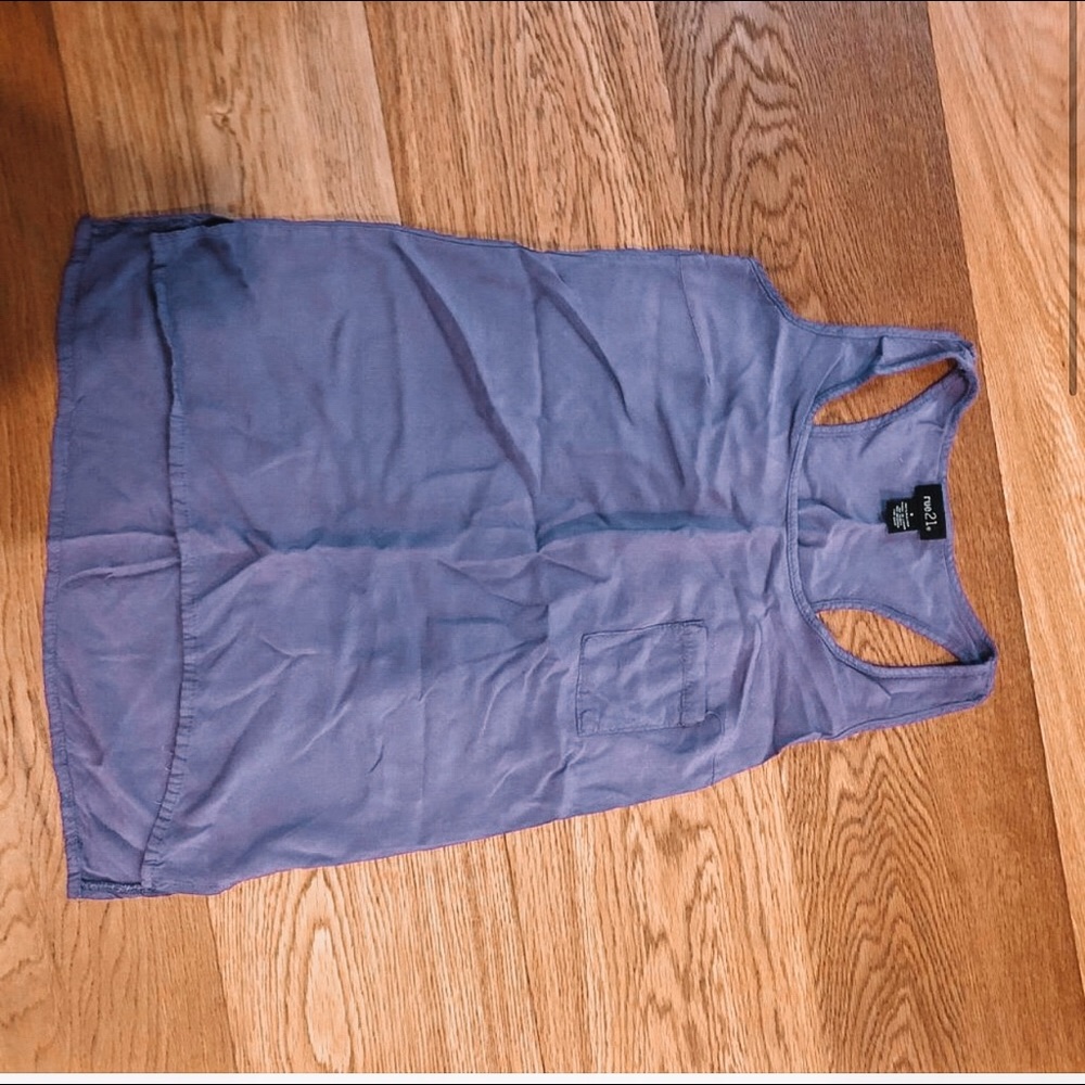 Womens flowy purple tank top with pocket.